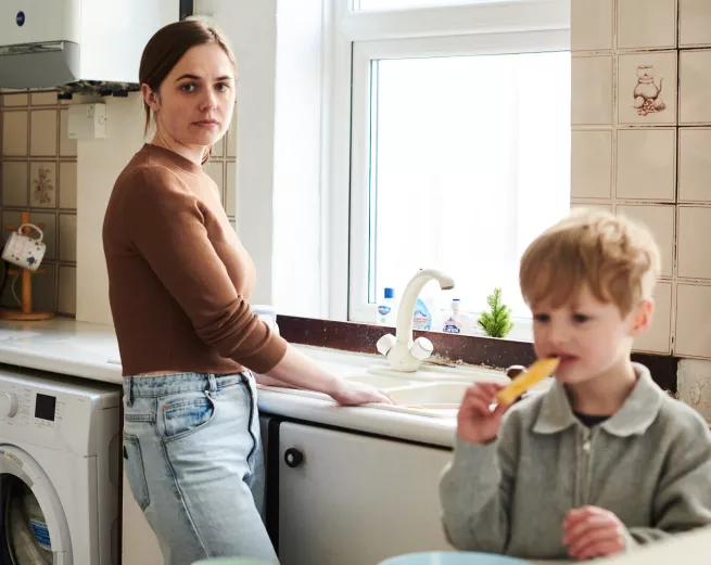 Amy and Leo at home in their kitchen