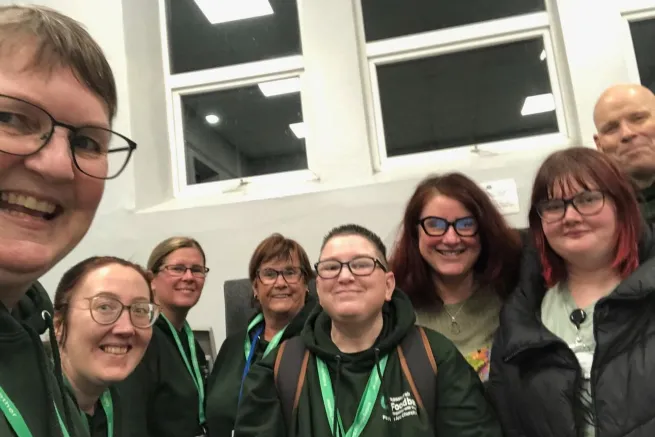 Eight food bank volunteers take selfie
