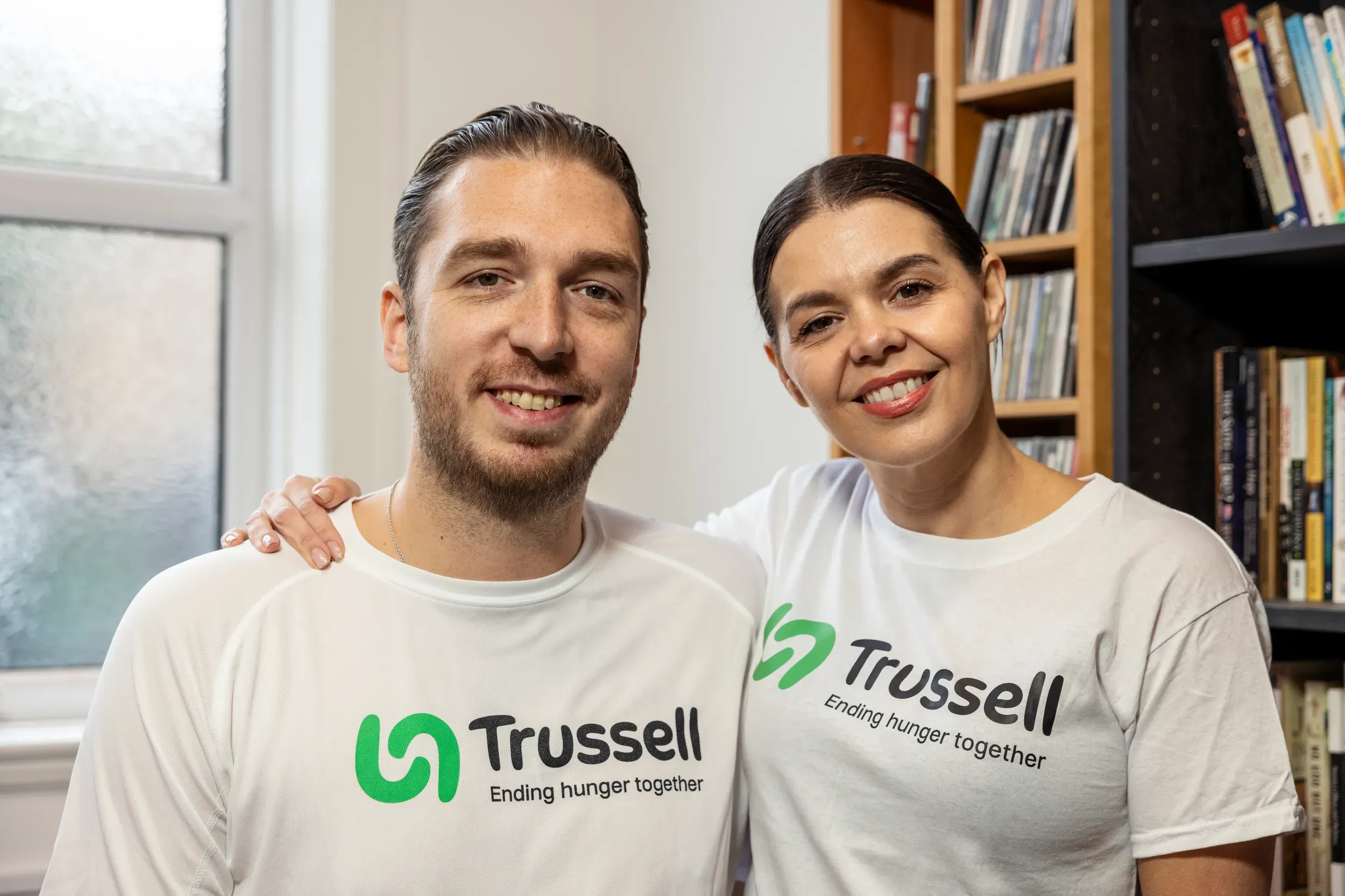 Mark and Roxanne Hoyle from the Ladbaby wearing T-shirts with the Trussell logo