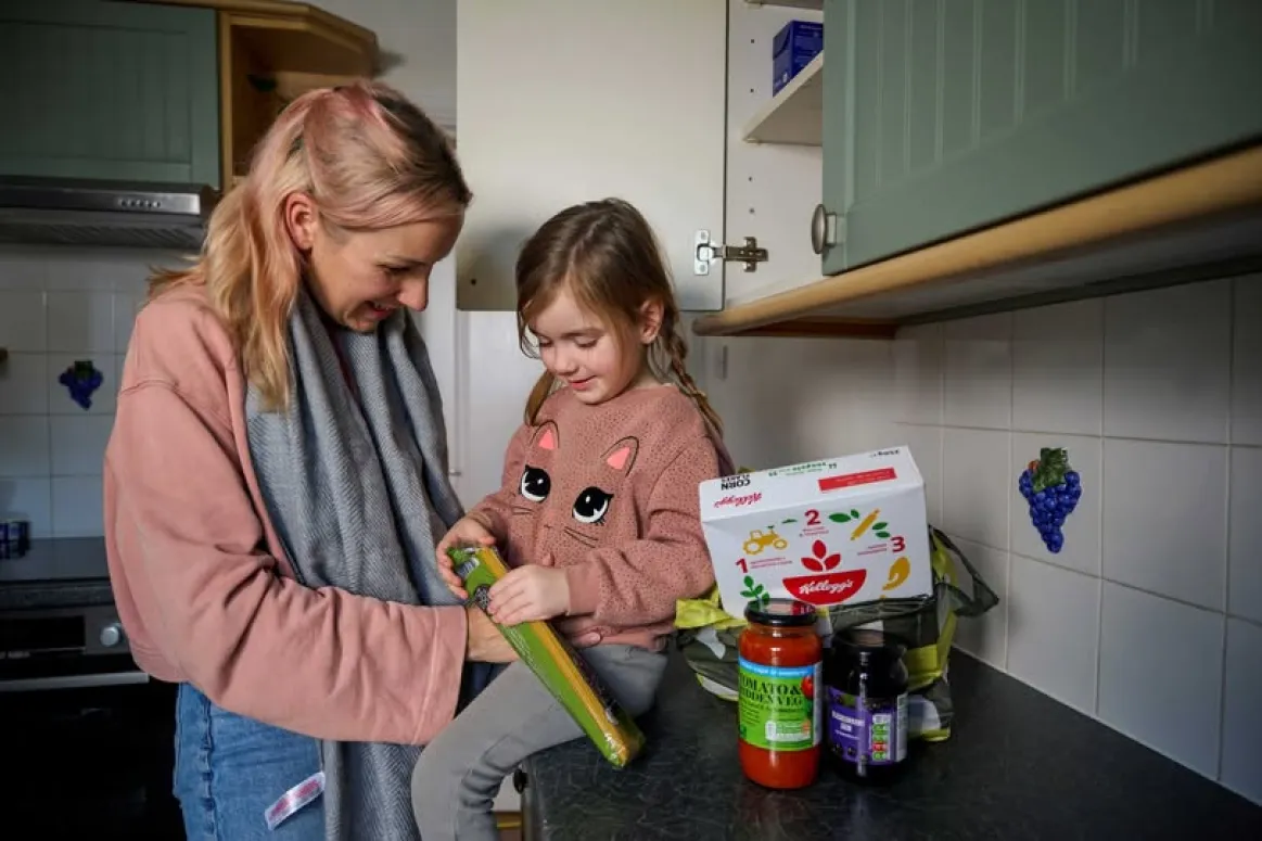 Family unpacking food