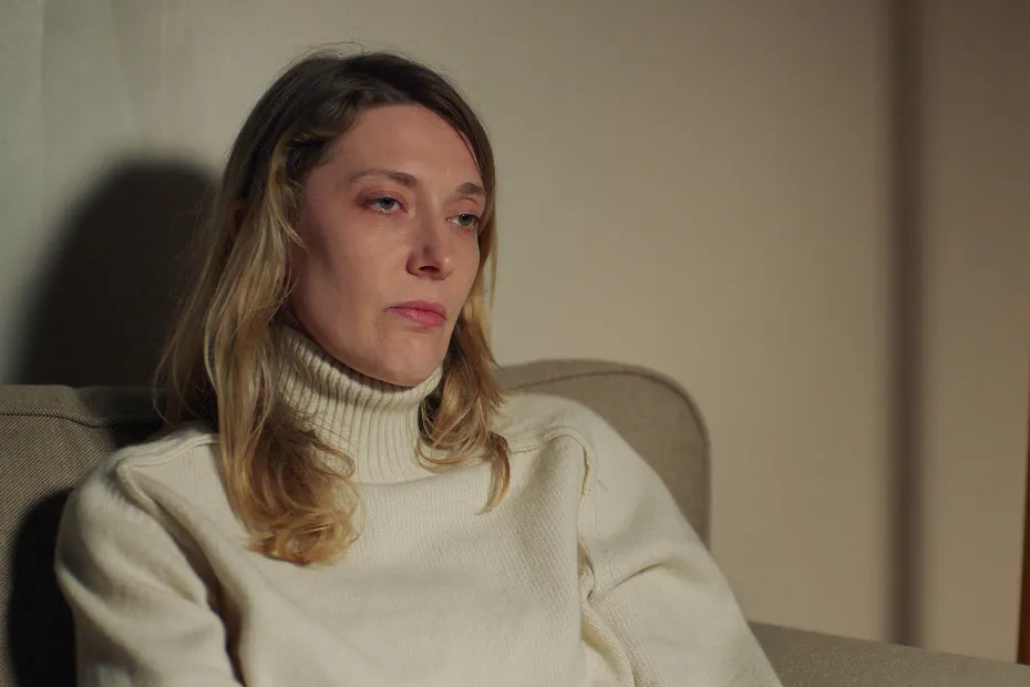 A woman sitting on a sofa