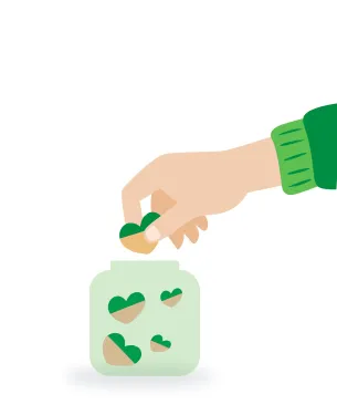 a hand putting love hearts into a jar