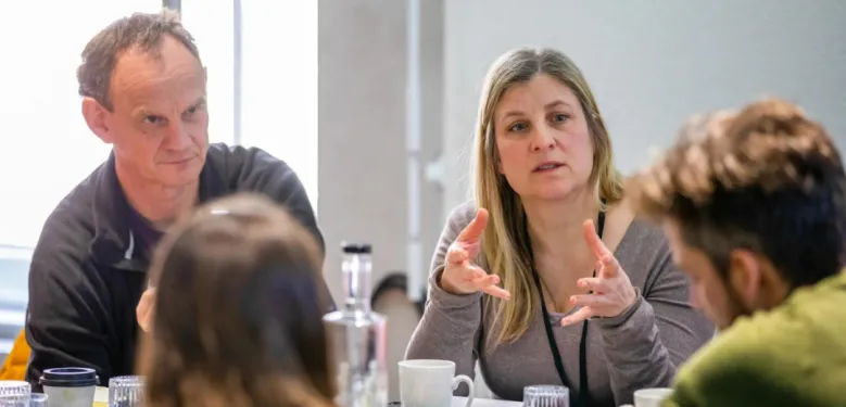 Four people having a discussion