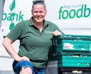 Photo of Strategic Project Manager in front of Foodbank van