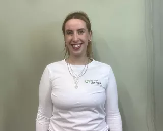 Image of women in white tshirt, blond hair