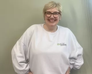 Image of women in white tshirt, blond hair