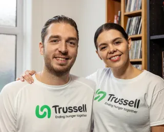 Mark and Roxanne Hoyle from the Ladbaby wearing T-shirts with the Trussell logo