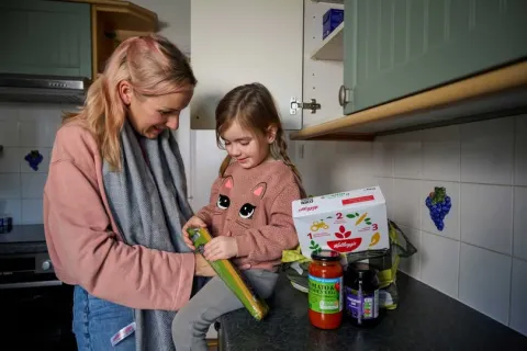Family unpacking food