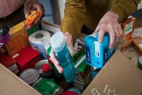 Selection of donated items in a box